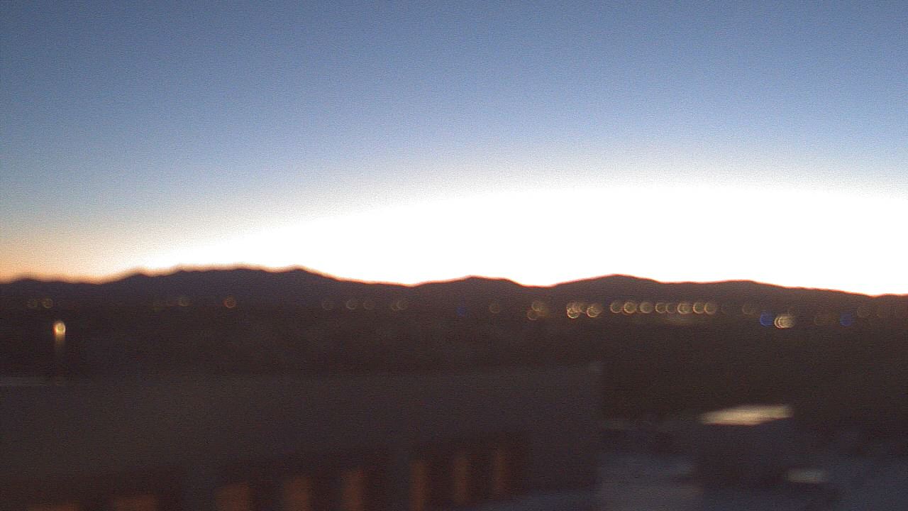 Thumbnail for current weather camera view from Amy Biehl ES in Rancho Viejo, New Mexico